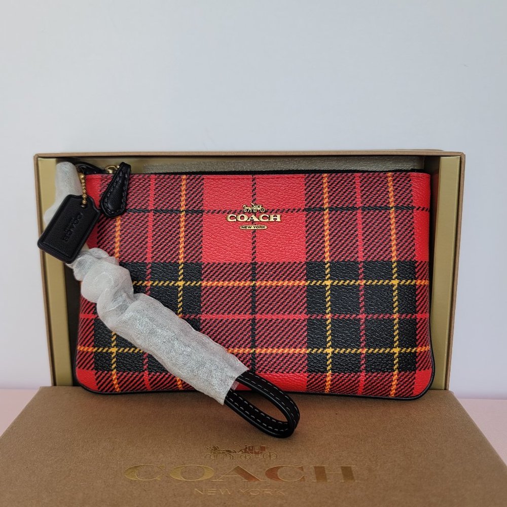 COACH Small Printed Plaid Coated Canvas Wristlet- Red Multi $75. ⭐
